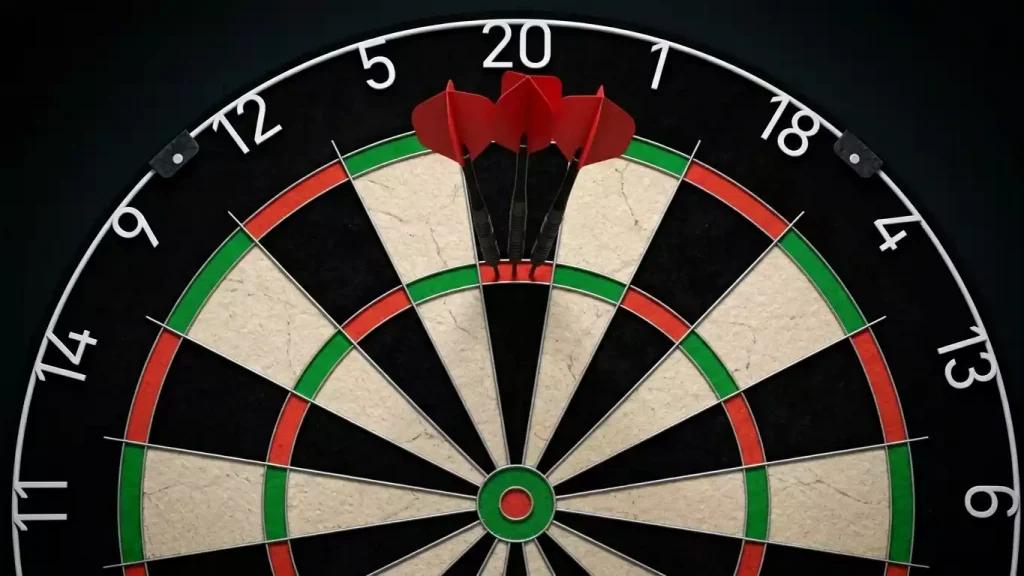 Dartscheibe mit drei Pfeilen im Triple-20 als Teil einer 9-Darter-Wurfsequenz